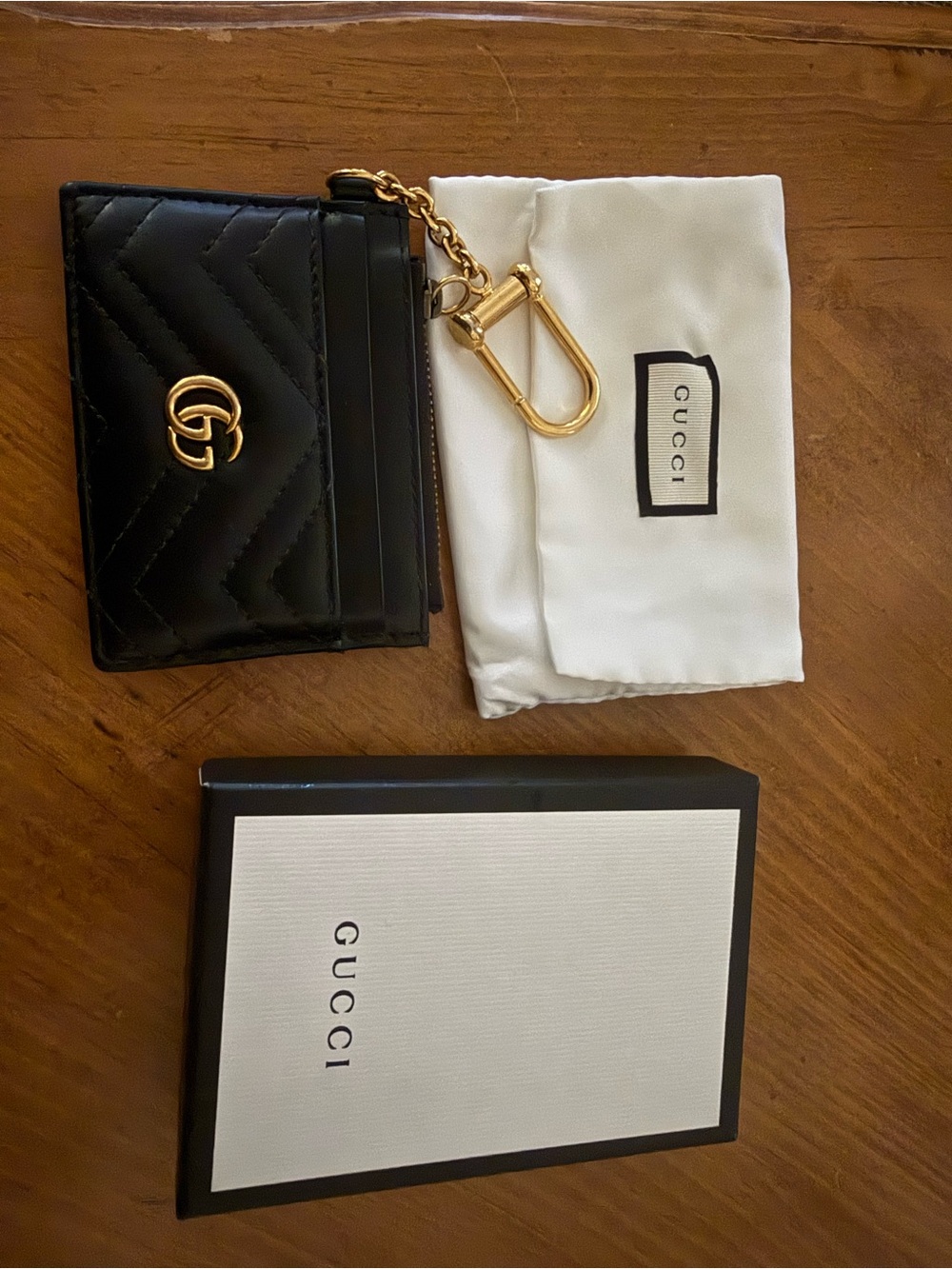 Gucci Black Quilted GG Card Case with Gold Keychain Accent